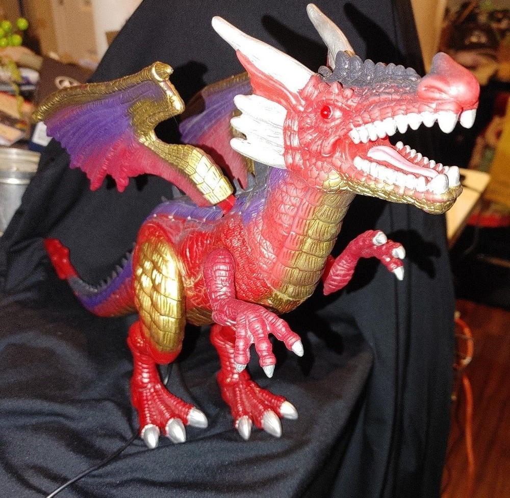 Dragon Animal Planet wired remote control Tested works. Sounds eyes light up